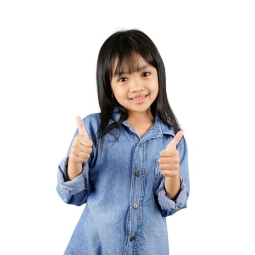 A girl giving a thumbs up sign